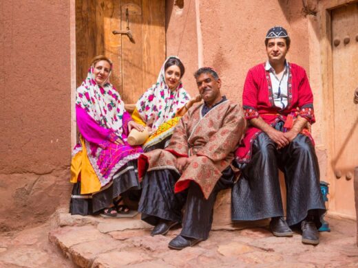 Family in traditional clothes in Abyaneh, Iran